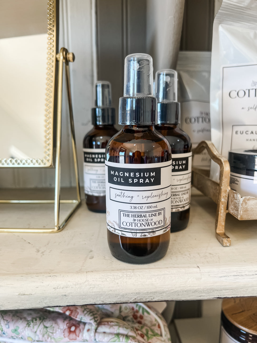 Magnesium Oil Spray sitting on a counter by House of Cottonwood
