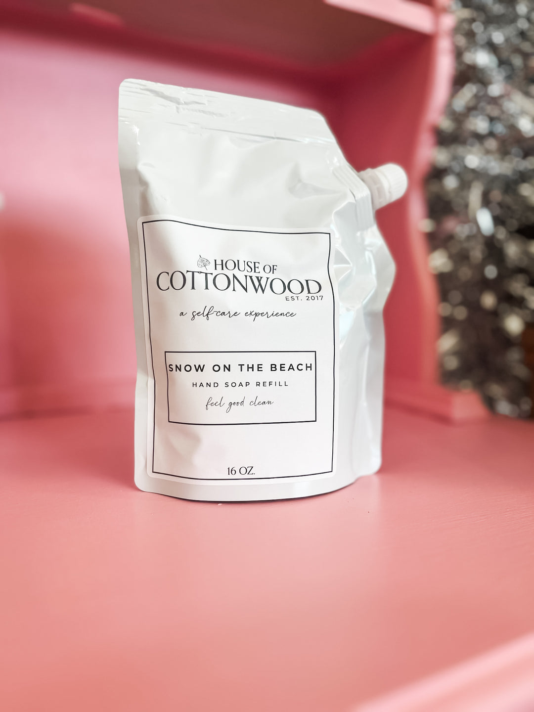 A white stand-up pouch of House of Cottonwood &