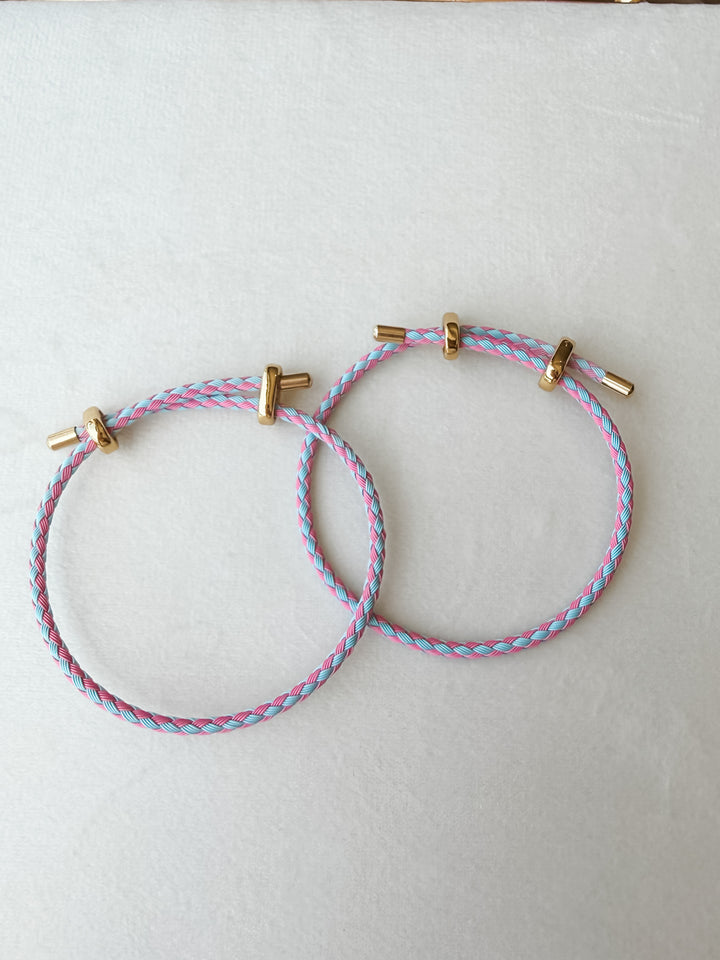 Two blue and pink adjustable paracord bracelet with gold accents