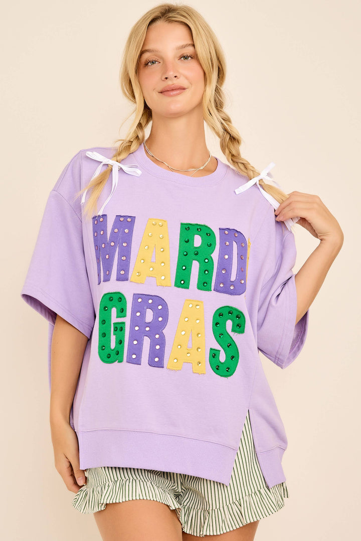 Woman wearing a purple &