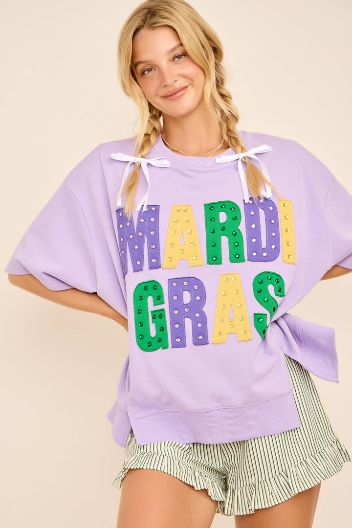Woman wearing a purple &