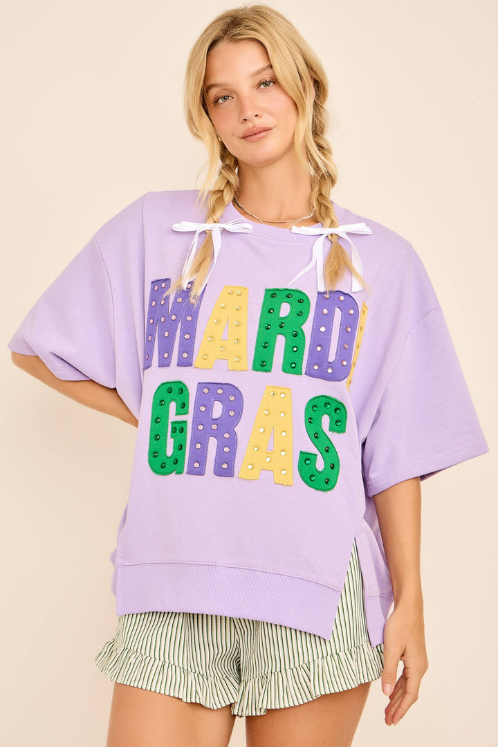 Woman wearing a purple &