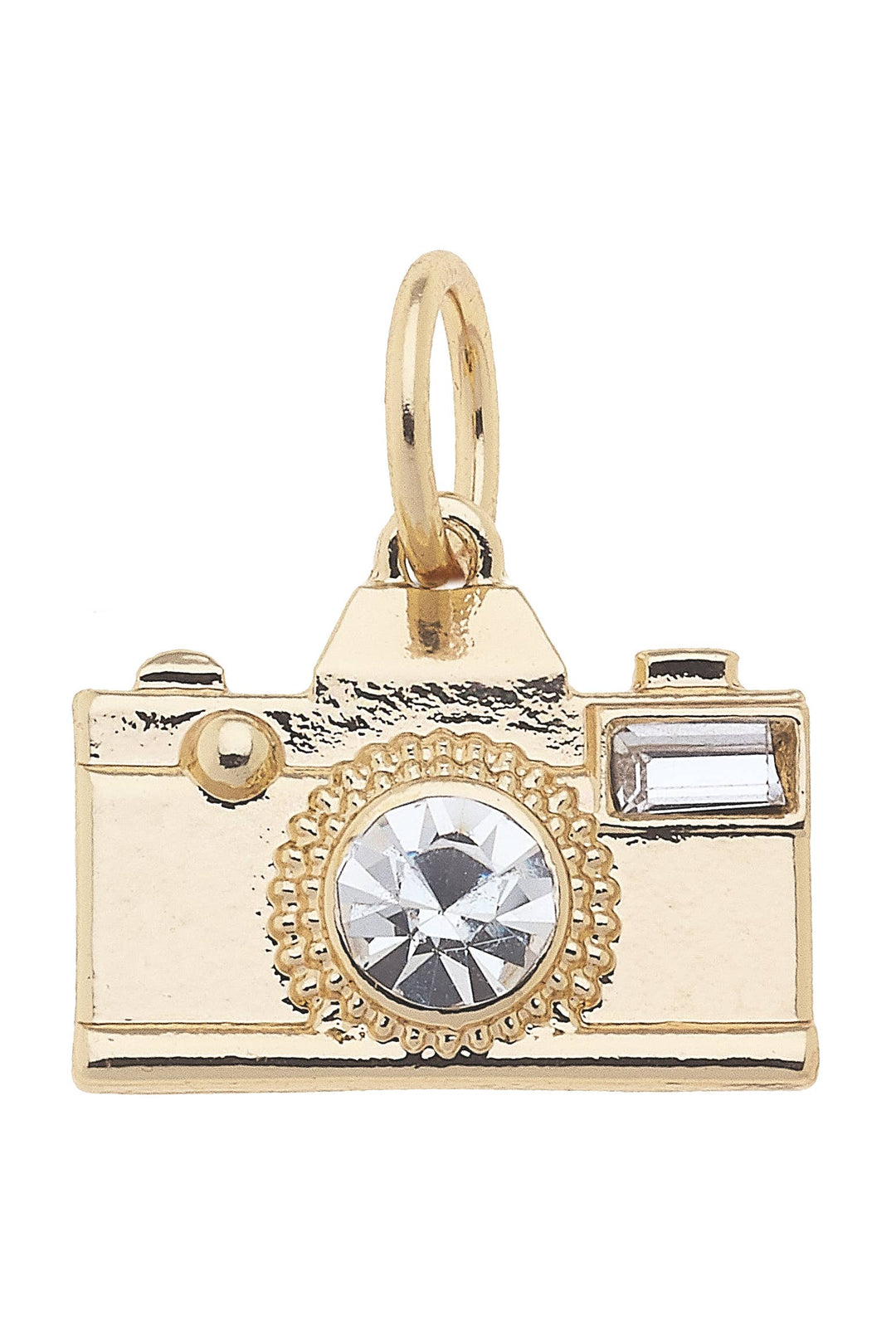 A shiny gold vintage camera charm encrusted with a large central rhinestone, with additional small rhinestones for decoration.