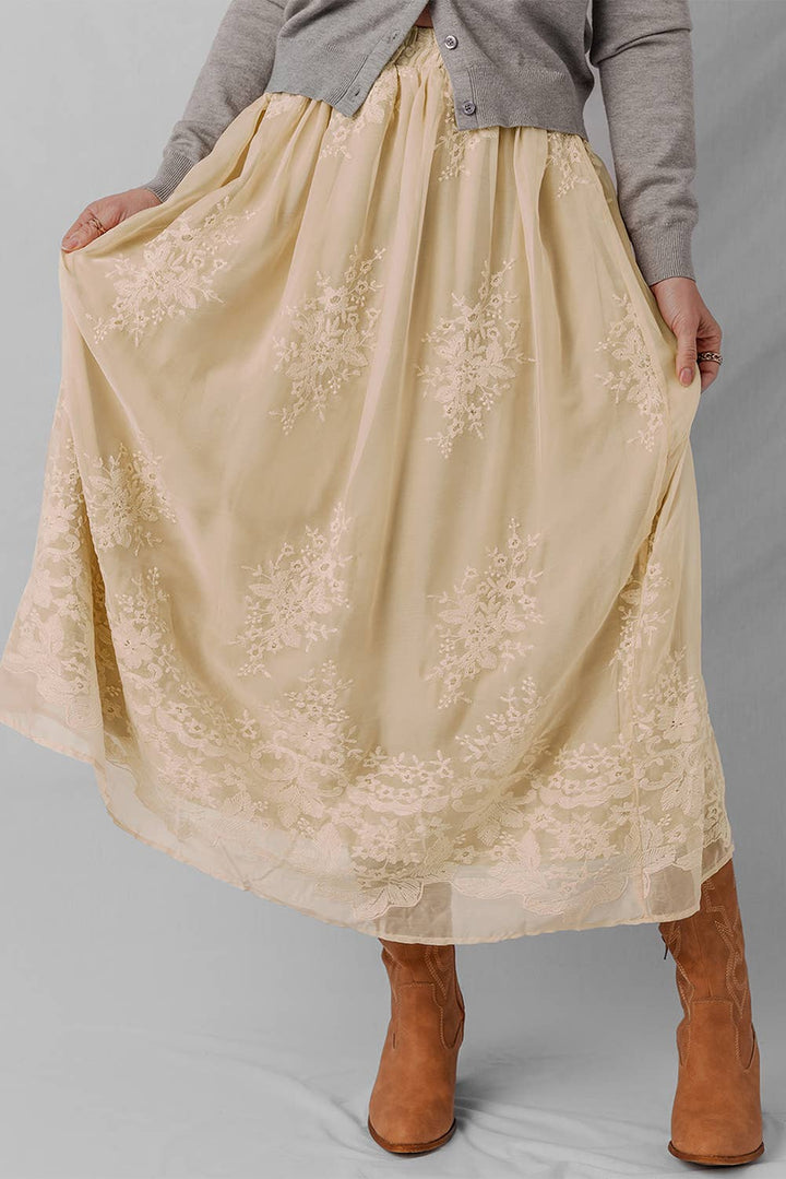 Woman wearing a beige lace skirt 