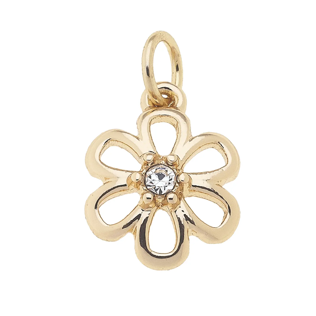 Gold flower-shaped charm pendant with a central gemstone 