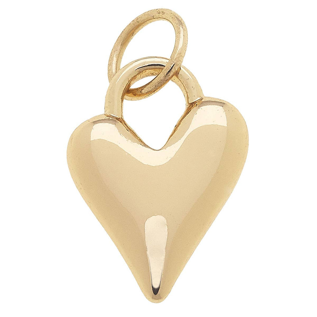 A shiny gold puffy heart charm with a loop on top for attachment, isolated on a white background.
