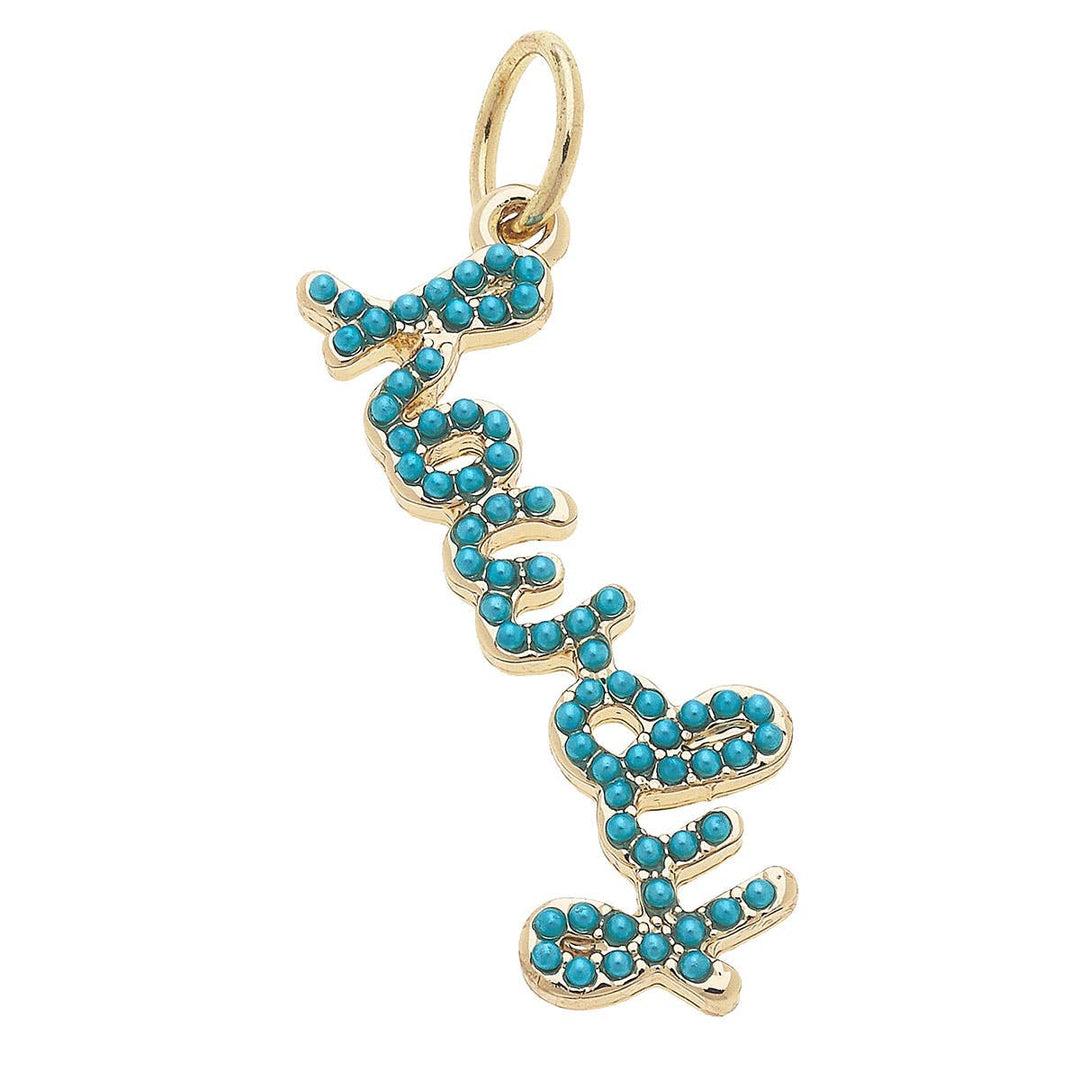 Charm with 'howdy' in script and turquoise accents