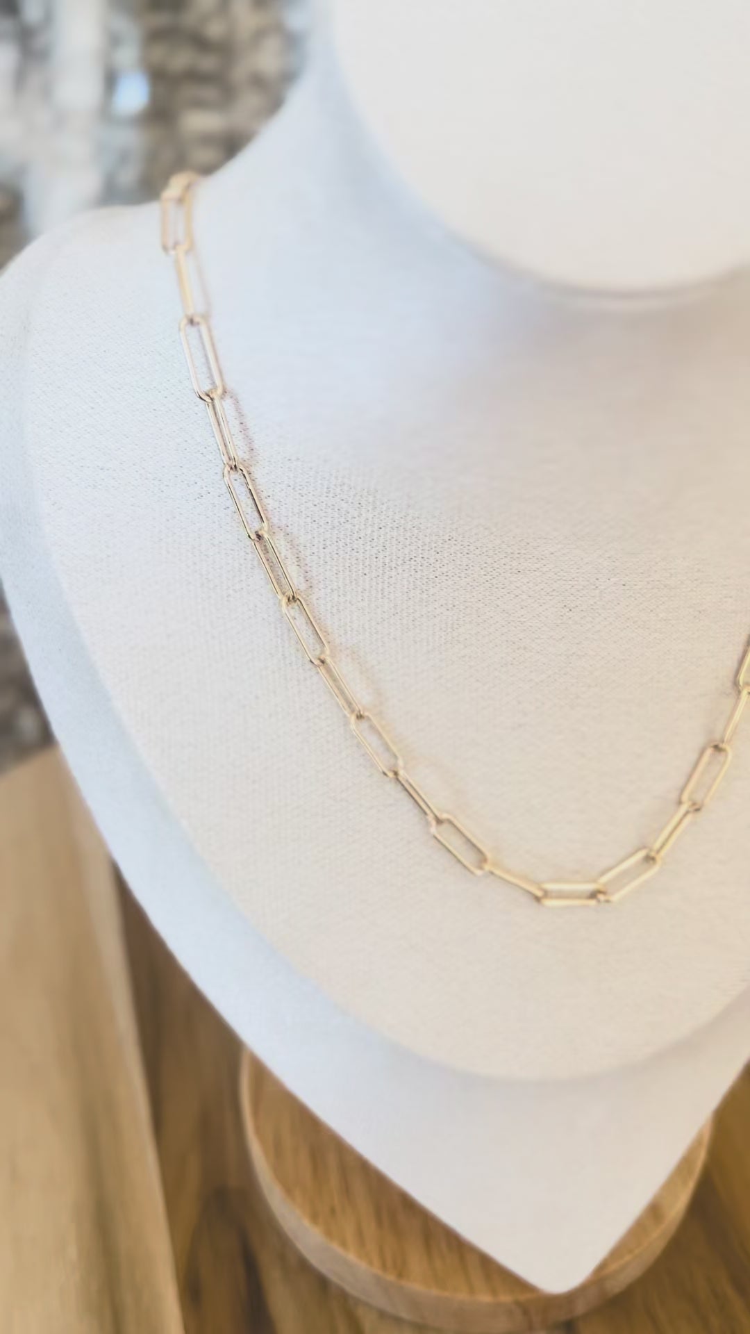 Video of gold elongated round paper clip necklace