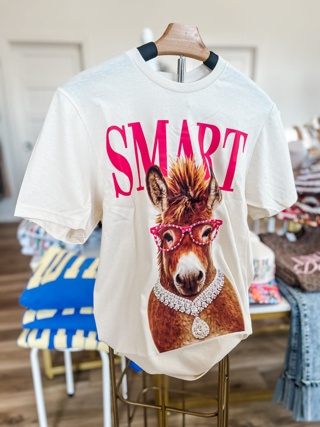 White t-shirt with a donkey graphic and &